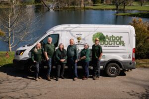 Team in front of van