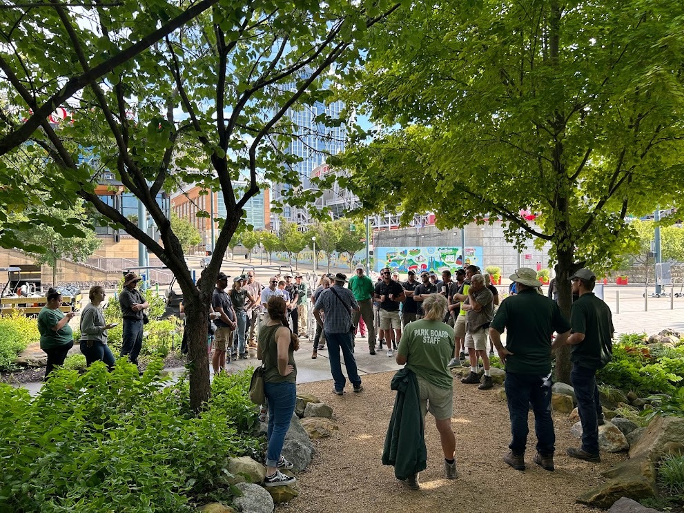 group gathered together in park